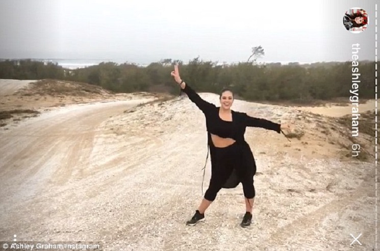 Ashley Graham shows off tummy in crop top as she enjoys safari in Africa