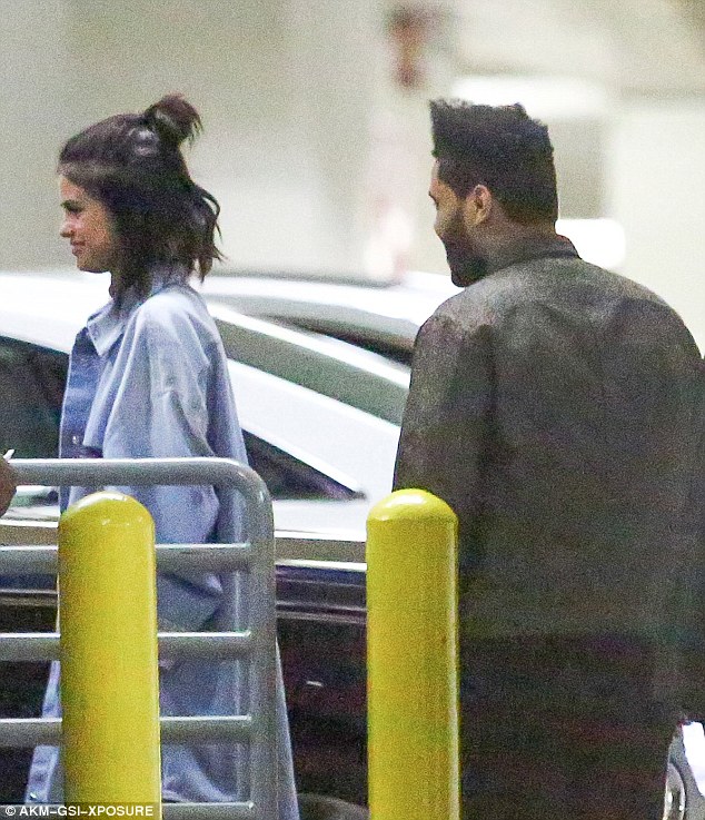 Selena Gomez and The Weeknd caught holding hands on romantic date at arcade