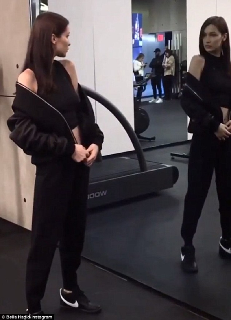 Bella Hadid bares her toned tummy in behind-the-scenes footage for latest modeling gig with Nike