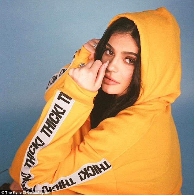 Kylie Jenner shows off voluptuous figure in her own Brand’s yellow tracksuit