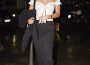 Braless Bella Hadid flaunts her cleavage in a plunging pleated Bardot top
