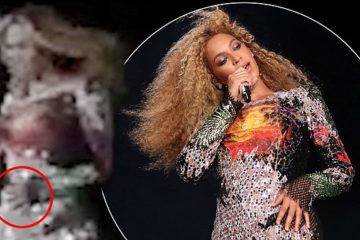 Beyonce cradles her stomach during Performance in Rome